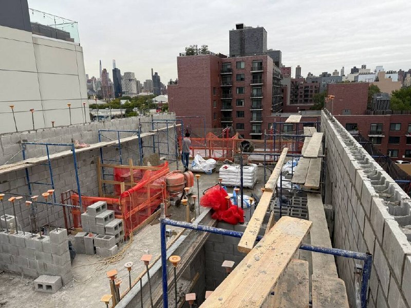 CMU block walls and rooftop pour with NYC skyline
