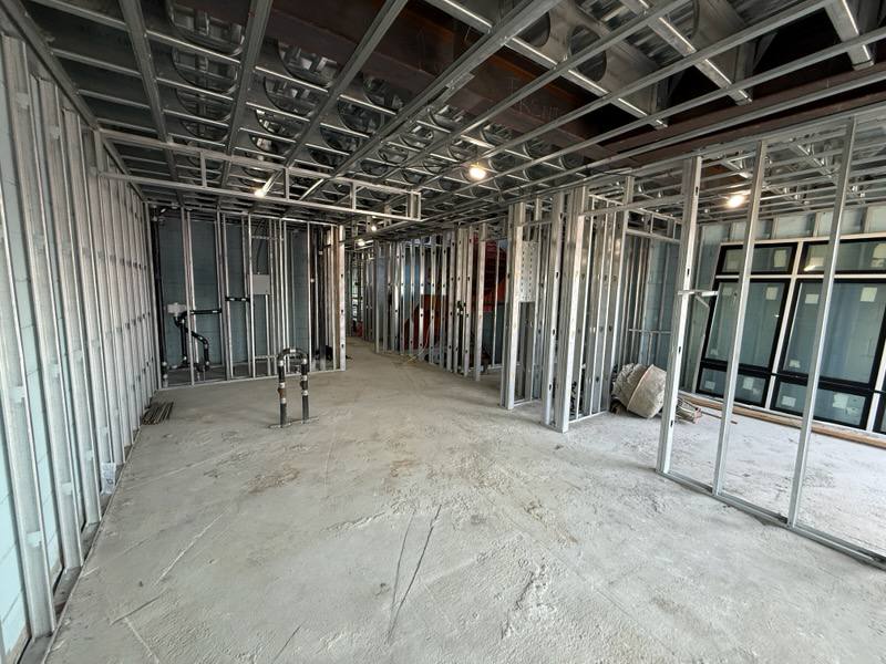 Interior metal stud framing and overhead duct rough-in